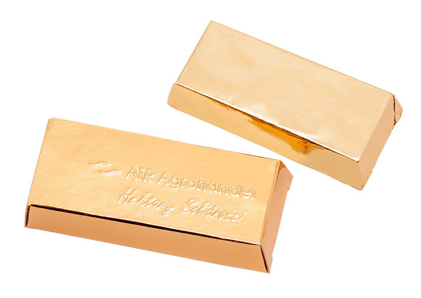Personalizowana czekolada w kształcie sztabki zapakowana w srebrną folię aluminiową i karton z tłoczonym logo firmy